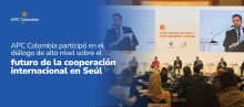 Foto del evento en la que se ven los panelistas y el publico